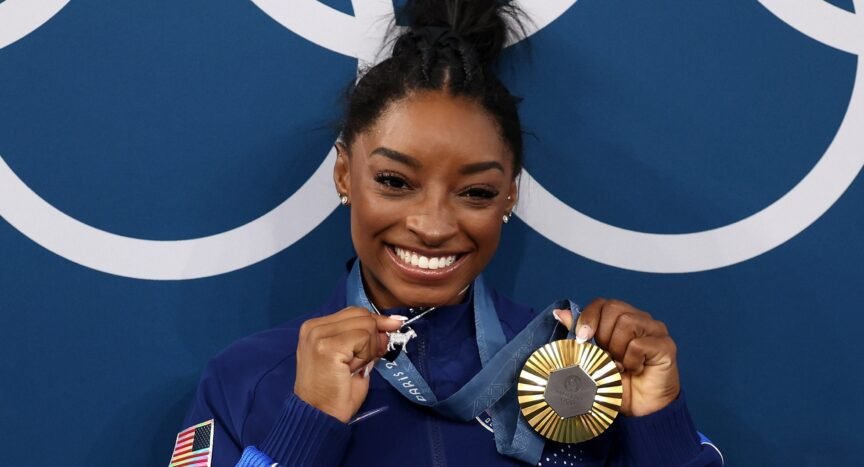 simone-biles-wins-the-gold-medal—and-her-necklace-proves-she’s-a-goat